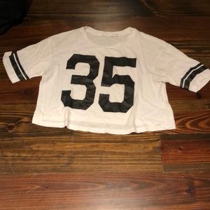 Sports style graphic tee.